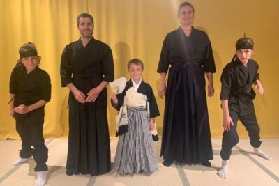 Samurai Sword Experience (Family Friendly)at SAMURAI MUSEUM TOKYO - Dressing like a samurai: hakama, helmet, and the photo setup