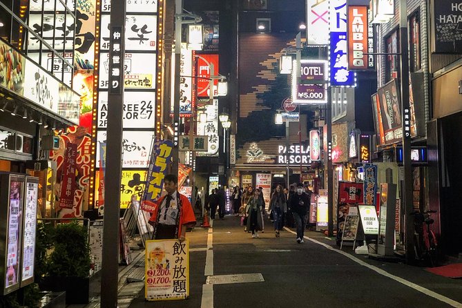 Shinjuku Golden Gai Food Tour - Golden Gai finish at Araku Bar: tiny bars, included drinks, and the option to karaoke