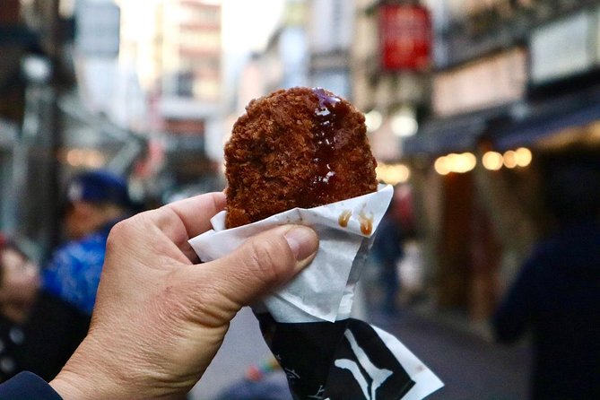 Tokyo: Food Tour in Ueno with 10+ Tastings of Japanese Classics - Stop 1: Indoor-Outdoor Market Energy (Food, Gifts, and Quick Sightlines)