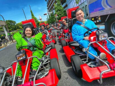 Tokyo: Street Kart Experience in Shibuya - Finding the Shop: Neon Logo, Mirror Garage, and a Staircase