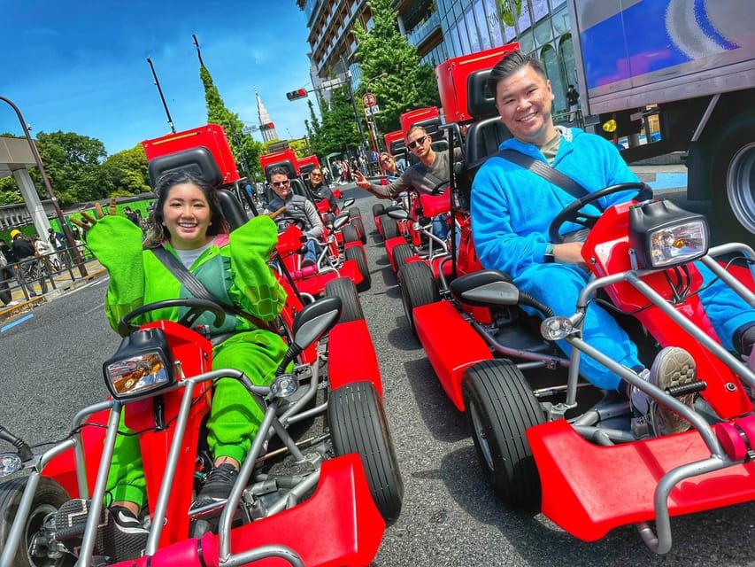 Tokyo: Street Kart Experience in Shibuya - Finding the Shop: Neon Logo, Mirror Garage, and a Staircase