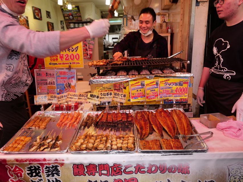 Tokyo: Tsukiji Fish Market Tour with 6 Stops & Seafood Lunch - Entering Tsukiji Hongan-ji: a Buddhist start that helps you read the area